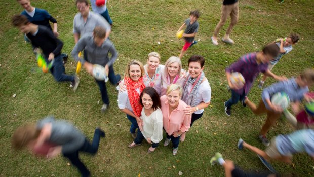 MOB members (back row, from left) Katie Wilson, Jane Windsor, Wendy Elson and Kath Brassington and (front, from left) Julie Wright and Mary-Lou Condon, with their boys in New Farm Park, Brisbane.