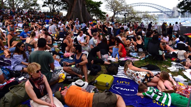 Crowds build as they wait for New Year's Eve fireworks on Sydney Harbour in 2016. 