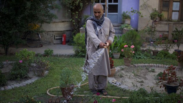 Kaka Khalil watering his garden in the old city, Kabul, May 2017