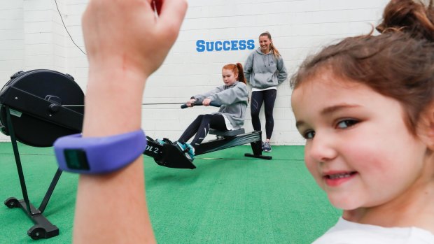 Madi, 6, and her sister Taylah, 10, love their fitness trackers.