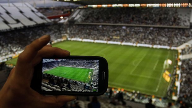 Screens and broadcast technology are keeping sports fans in their lounge rooms.