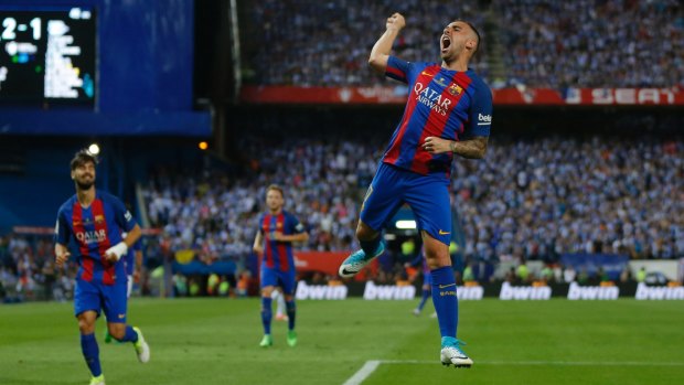 Paco Alcacer celebrates after scoring Barcelona's third goal.