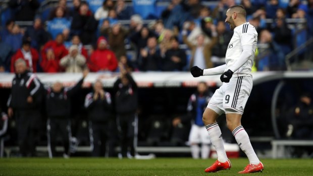 Real Madrid's Karim Benzema celebrates a goal against Real Sociedad.