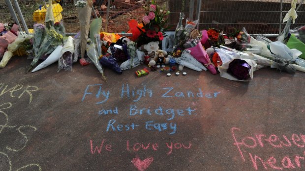 Messages written at the Swanston Street site where Alexander and Bridget Jones were killed by a falling wall.