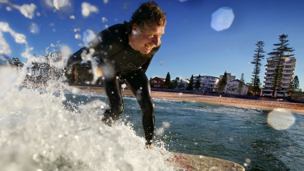 Midget Farrelly surfs at Manly Beach 40 years after winning the first World Surfing Championships held there in 1964. 