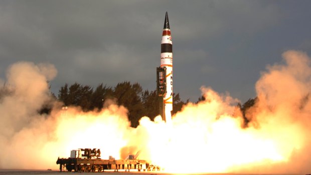 A photo released by the Indian Ministry of Defence of their nuclear-capable Agni-V missile, capable of striking Beijing and Shanghai, being launched in 2012.