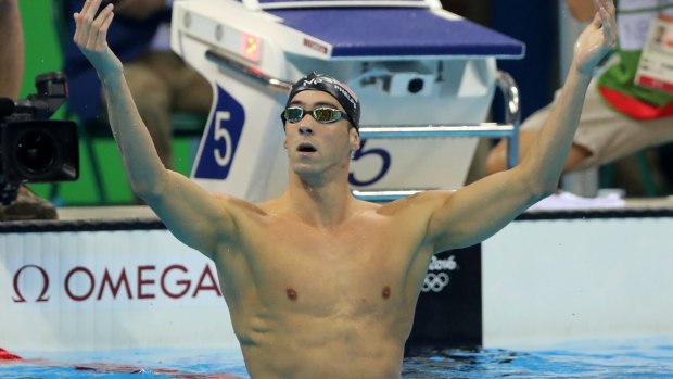 Phelps celebrates winning the gold medal in the men's 200m butterfly.