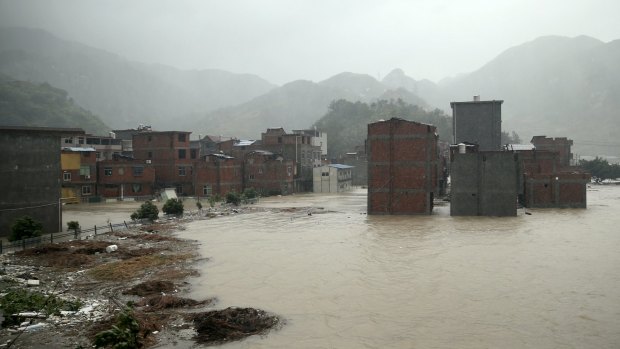 A town is seen submerged as it is hit by Typhoon Soudelor in Ningde, Fujian province, China.