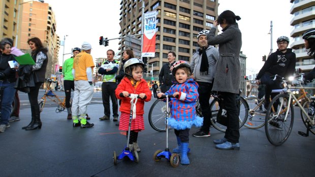 Youngsters at a protest by cyclists against government moves to remove a cycleway in Sydney.