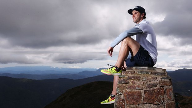 Aiming high: Blues skipper Marc Murphy at the summit of Mount Buller.