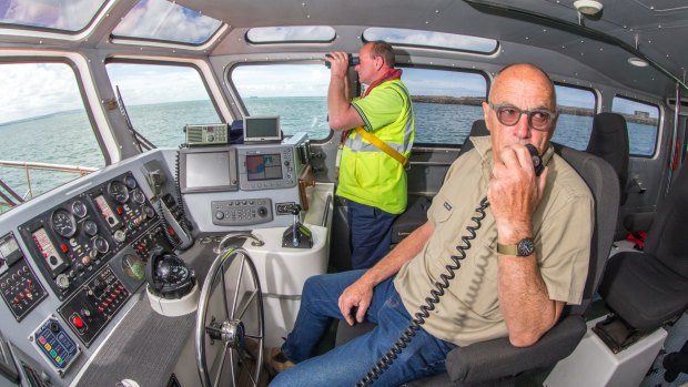 Calm nerves and decades of experience: Launch masters Dick Smith (left) and Bill Fellows (right) keep their eyes peeled.