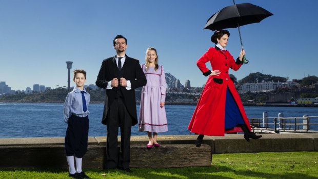 Happy place: Sam Moran (second from left) as George Banks, with Penny McNamee as Mary Poppins, along with their stage children from the musical theatre production. 