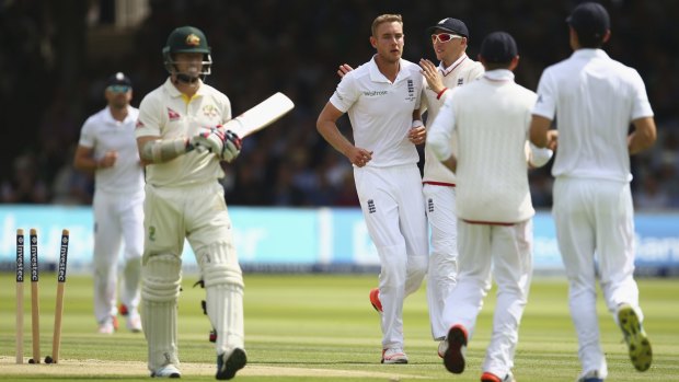 End of a fine innings: Stuart Broad celebrates after taking the wicket of Chris Rogers.