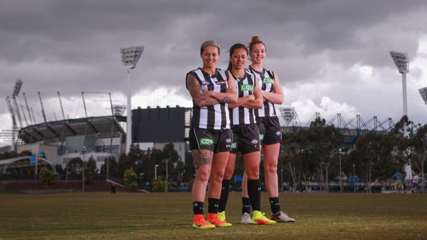 Collingwood footballers (L-R) Mo Hope, Helen Roden and Emma King pose for a photo ahead of the draft for the new AFL Women's League on October 11.