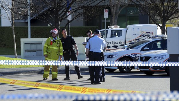 Emergency Services personnel attend the incident at Brindabella Business Park last September.