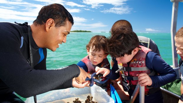 Children learn about sea life at the Jean-Michel Cousteau Fiji Islands Resort. 