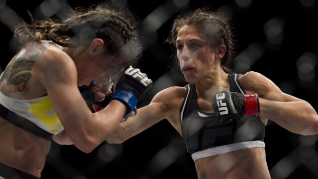 Joanna Jedrzejczyk used blistering striking combinations to orchestrate a come-from-behind decision victory over bitter rival Claudia Gadelha.