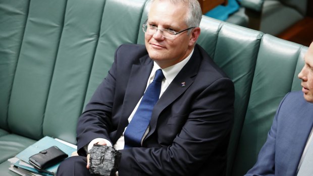 Treasurer Scott Morrison with a lump of coal during Question Time this week.