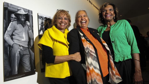 Captain Reg Saunders' daughters Dorothy Burton, Glenda Humes and Judith Standen inside the gallery named after their father.
