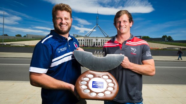 Queensland Country's James Slipper and Canberra Vikings centre James Dargaville at Parliament House on Friday. 