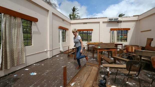 Foreign Affairs Minister Julie Bishop surveys the damage to Penang Sangam High School in Rakiraki.