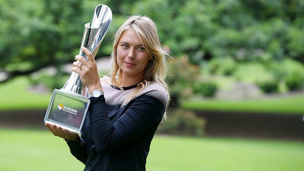 On a pedestal: Maria Sharapova shows off her 2015 Brisbane International silverware.