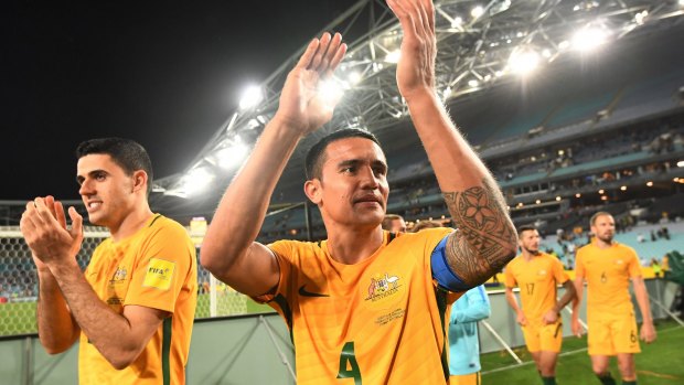 Next stop Central America: Australia's Tim Cahill (centre) and Tomas Rogic (left) applaud the crowd after their win over Syria at ANZ Stadium last week.