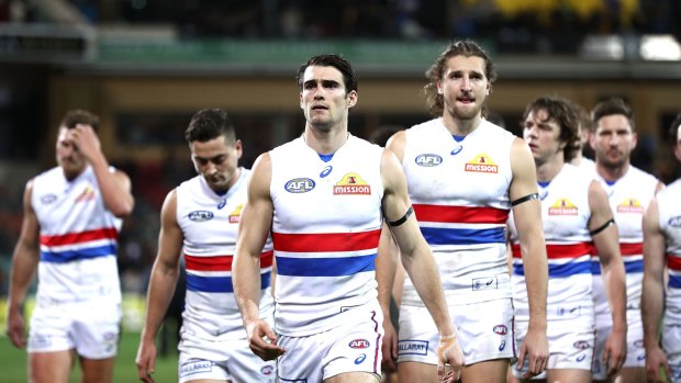 Easton Wood leads the Bulldogs from the ground after they were beaten by Adelaide.