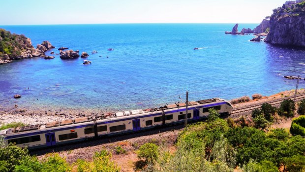 Train travel through Taormina in Sicily.