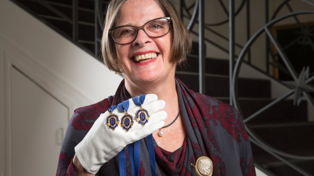In her parents' will, Suzie Horman's brothers each got a Brownlow medal. She got a brooch.