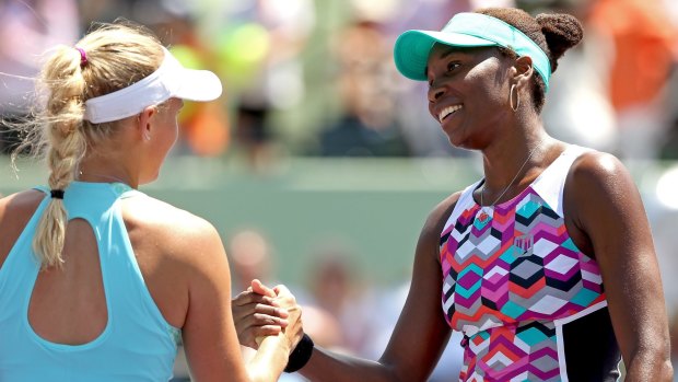 Caroline Wozniacki congratulates Venus Williams.