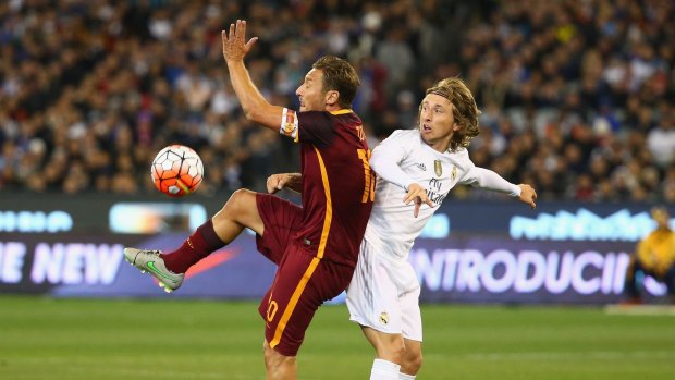 Francesco Totti and Luka Modric go head-to-head.