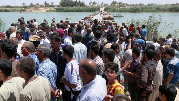 Displaced Iraqis from Ramadi on Saturday. 