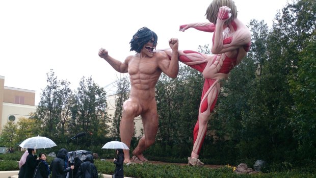 Two Titans battle it out outside Attack on Titan: The Real at Universal Studios Japan.