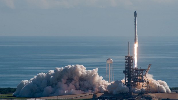 A SpaceX Falcon 9 rocket lifts off with the Pentagon's test vehicle attached.