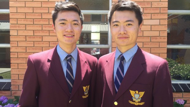Identical twins Nicholas Cheng (left) and Nathan Cheng (right), who have been named the joint dux at Marcellin College.