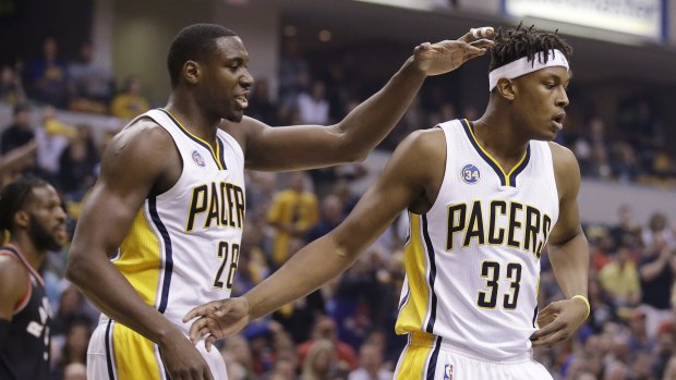 Indiana Pacers' Myles Turner is congratulated by Ian Mahinmi.