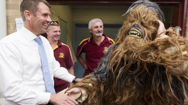 Chewie?: Mike Baird meets a yowie mascot at Queanbeyan Basketball Centre.