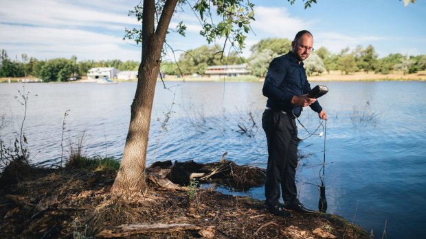 University of Canberra professor Ross Thompson testing water quality at Lake Burley Griffin.