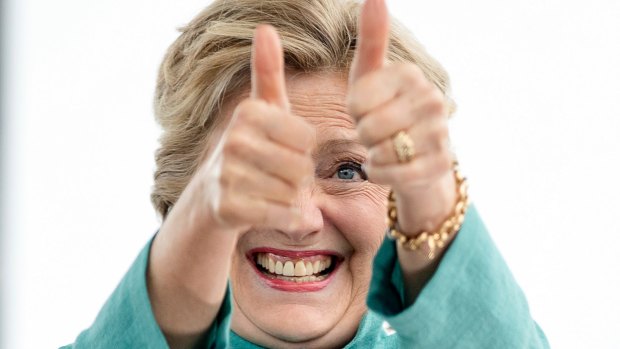 Hillary Clinton gives two thumbs up as she takes the stage to speak at a rally in Pembroke Pines, Florida.