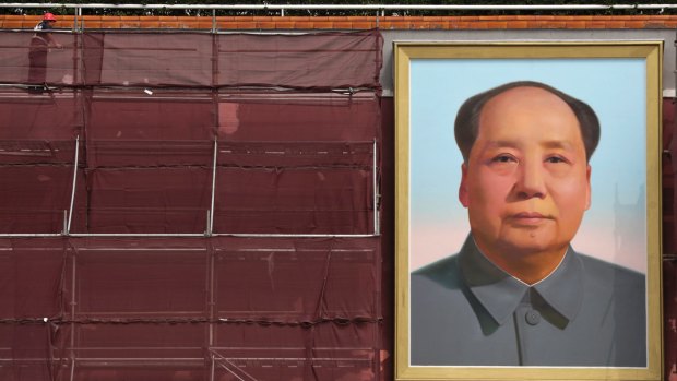 The portrait of Mao Zedong during a refurbishing on Tiananmen Gate in Beijing.