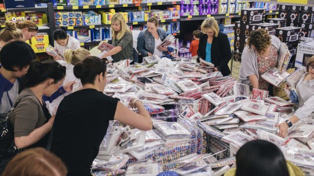 Mothers queued outside Aldi stores on to get their hands on Collette Dinnigan's clothing range for girls.