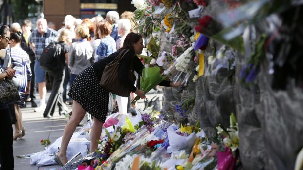 Remembering victims: Floral tributes continued to be left at Martin Place on Wednesday.