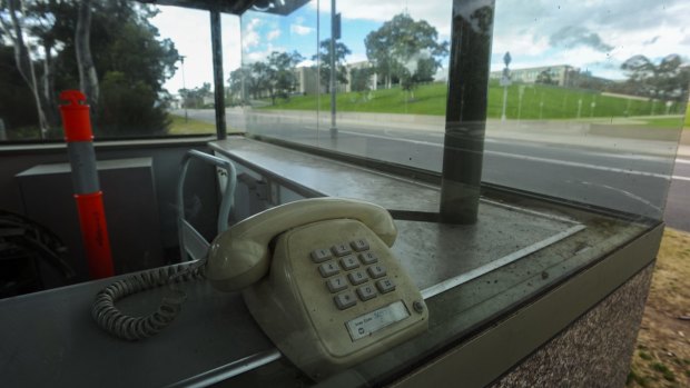 A retro push-button phone in one of the four unused guardhouses.