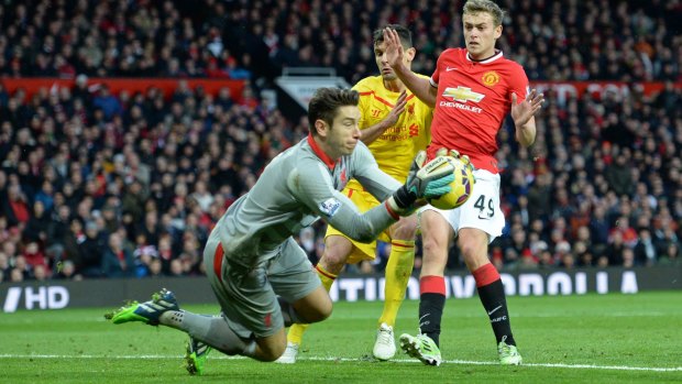 Red alert: Brad Jones makes a save against Manchester United at Old Trafford earlier this month.
