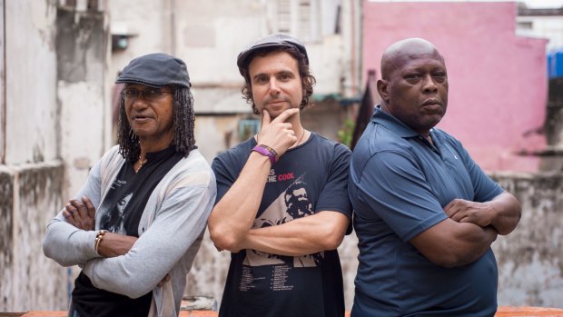 Jake Savona, centre, with the legendary Robbie Shakespeare, left, and Sly Dunbar.