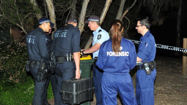 ACT police and forensics officers on the scene.