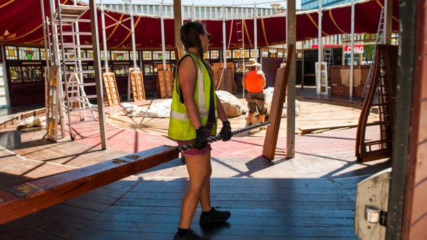 The Famous Spiegeltent's crew work to set it up outside the Canberra Theatre ahead of its opening night on Friday.