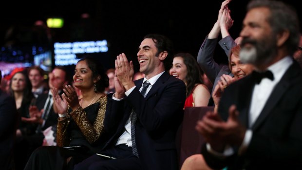 Isla Fisher's husband Sacha Baron Cohen applauding his wife during the 6th AACTA Awards.