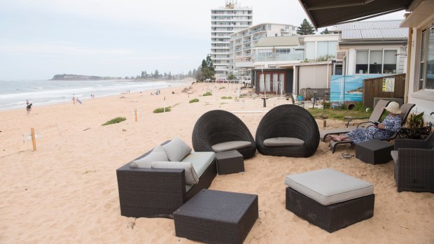 Residents at Collaroy make do after the June east coast low wiped out their swimming pool (buried beneath the sand).